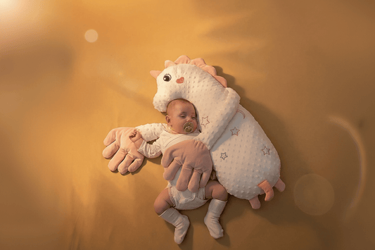 Doudou d'enfance licorne tapoteur bébé dort