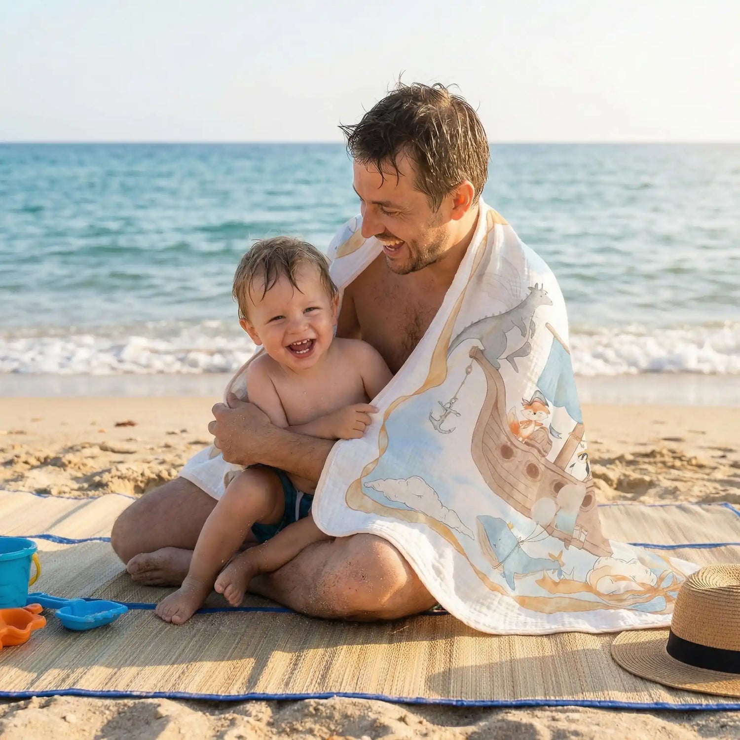 couverture bébé coton hyoallergénique tout usage bateau père fils plage