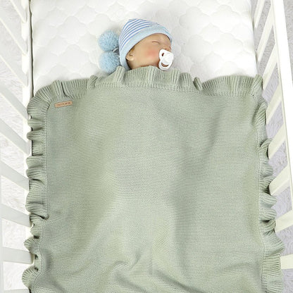 couverture bébé tricot Cocooning gris bébé dort lit