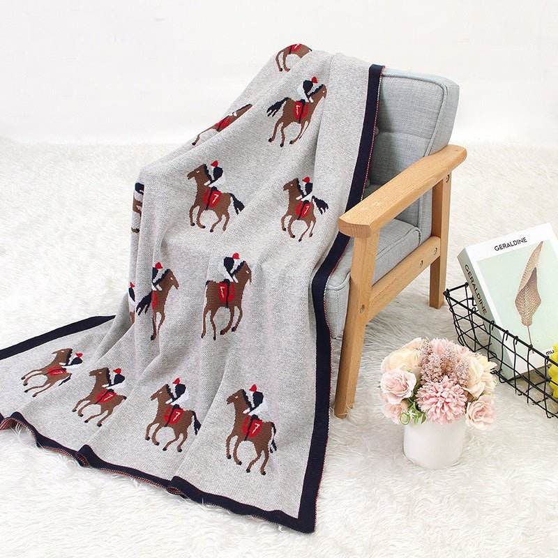 couverture en laine pour bebe chevalier étendu chaise