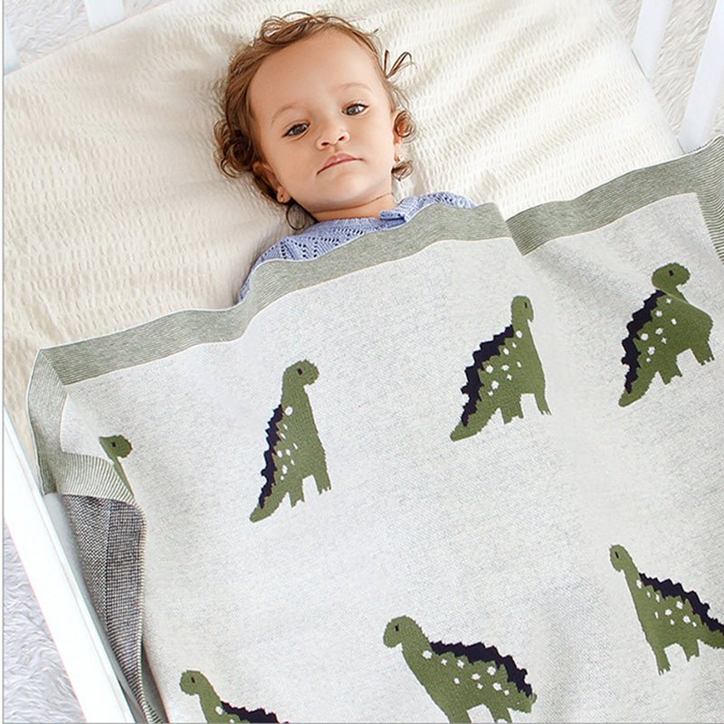 couverture en laine pour bebe dinosaure enfant couché