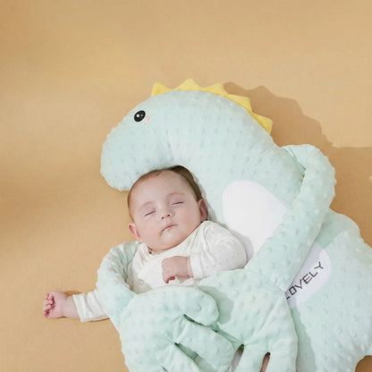doudou bébé câlin maternel rassurant dinosaure vert bébé dort paix