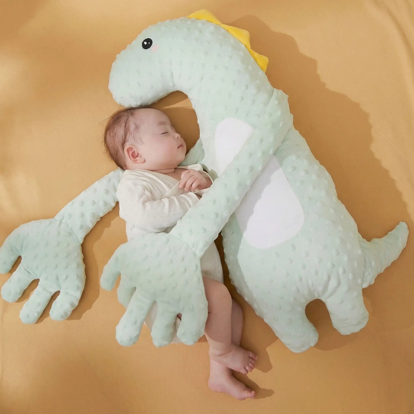 doudou bébé câlin maternel rassurant vert bébé dort