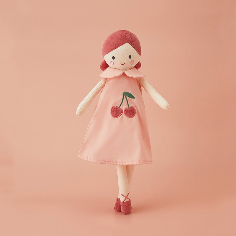 doudou fillette en robe rose cerise