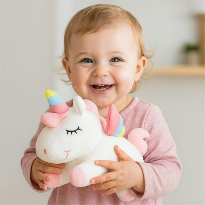doudou licorne douceur magique bébé blanc fillette  souriante calin