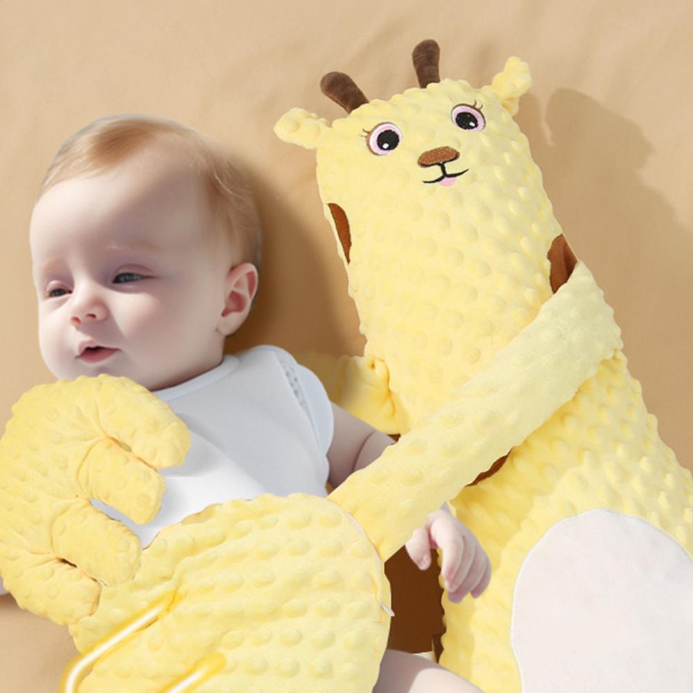 doudou mais apaisantes jaune bébé dort