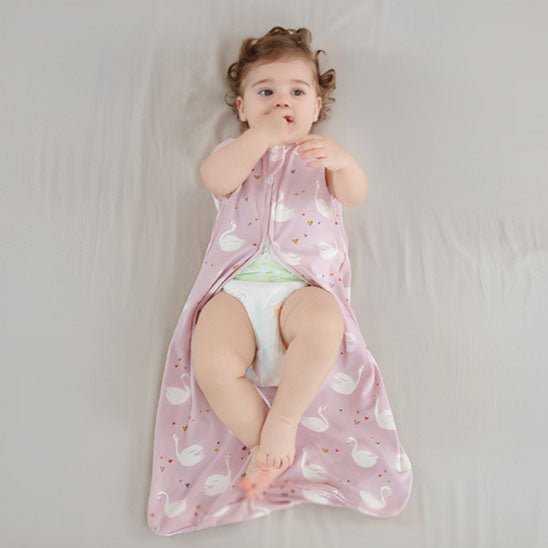 gigoteuse bébé rose enfant couché