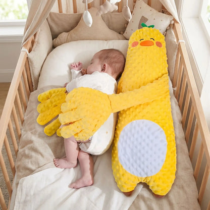 peluche qui tapote bébé canard jaune réconfortant bébé dort-berceau