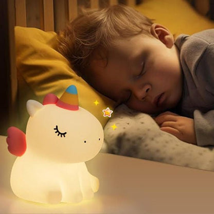 veilleuse bébé licorne fille dort a droite