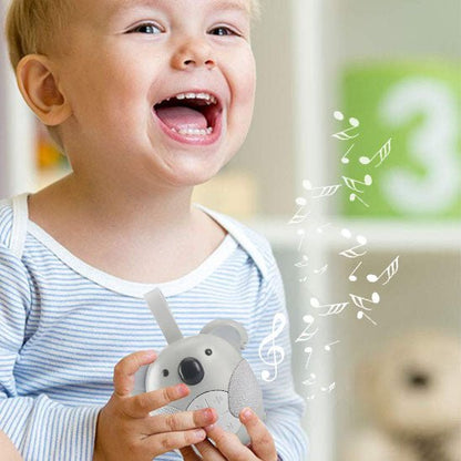 veilleuse bruit blanc koala dans les mains enfant joyeux