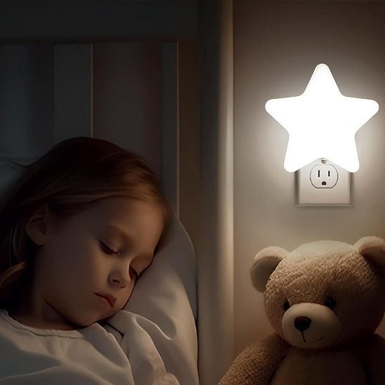 veilleuse enfant étoile blanche fillette dort