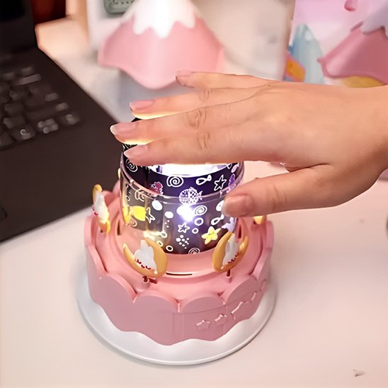 Veilleuse projection stellaire apaisante rose pèse bouton allumage